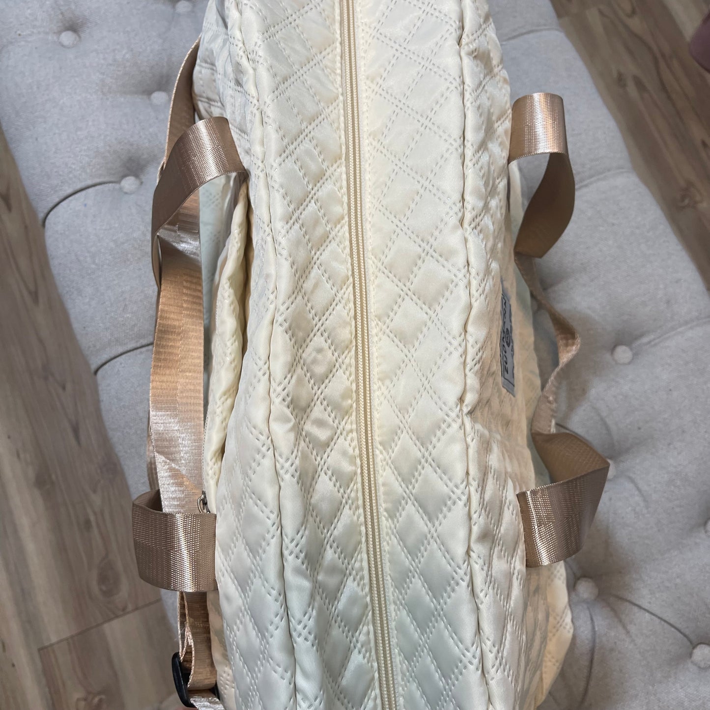 Cream duffel bag