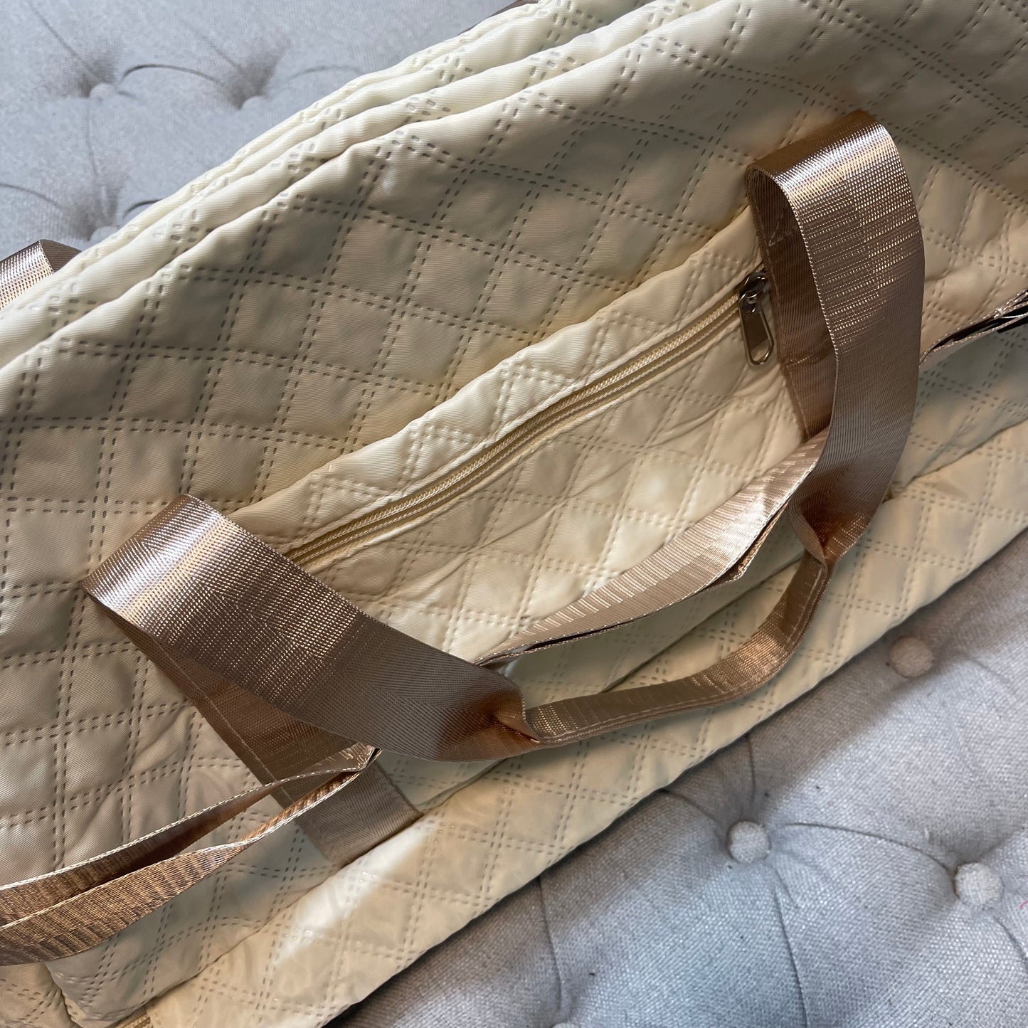 Cream duffel bag