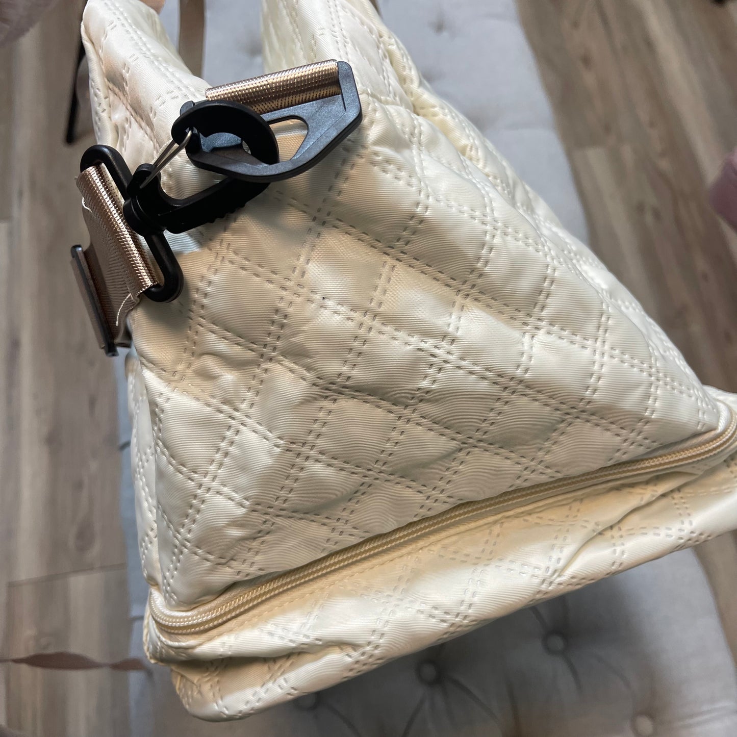 Cream duffel bag