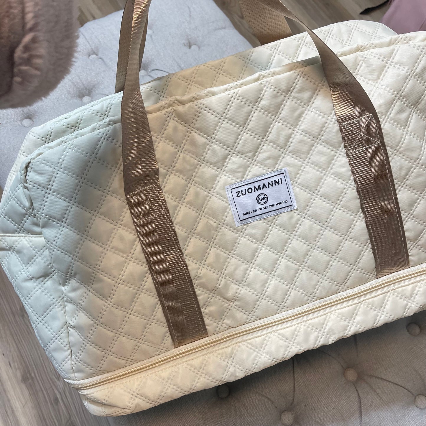 Cream duffel bag