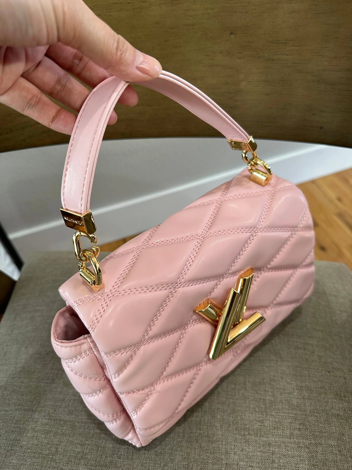 LV pink puffy twist bag